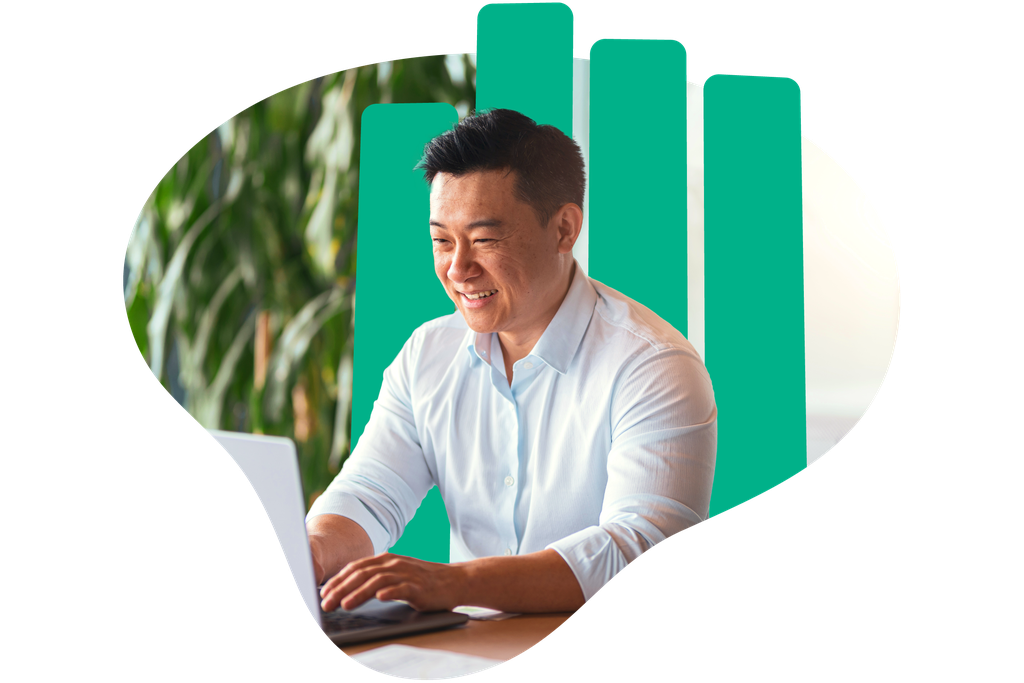 Smiling man in a white shirt working on a laptop, with green bar graph elements in the background.